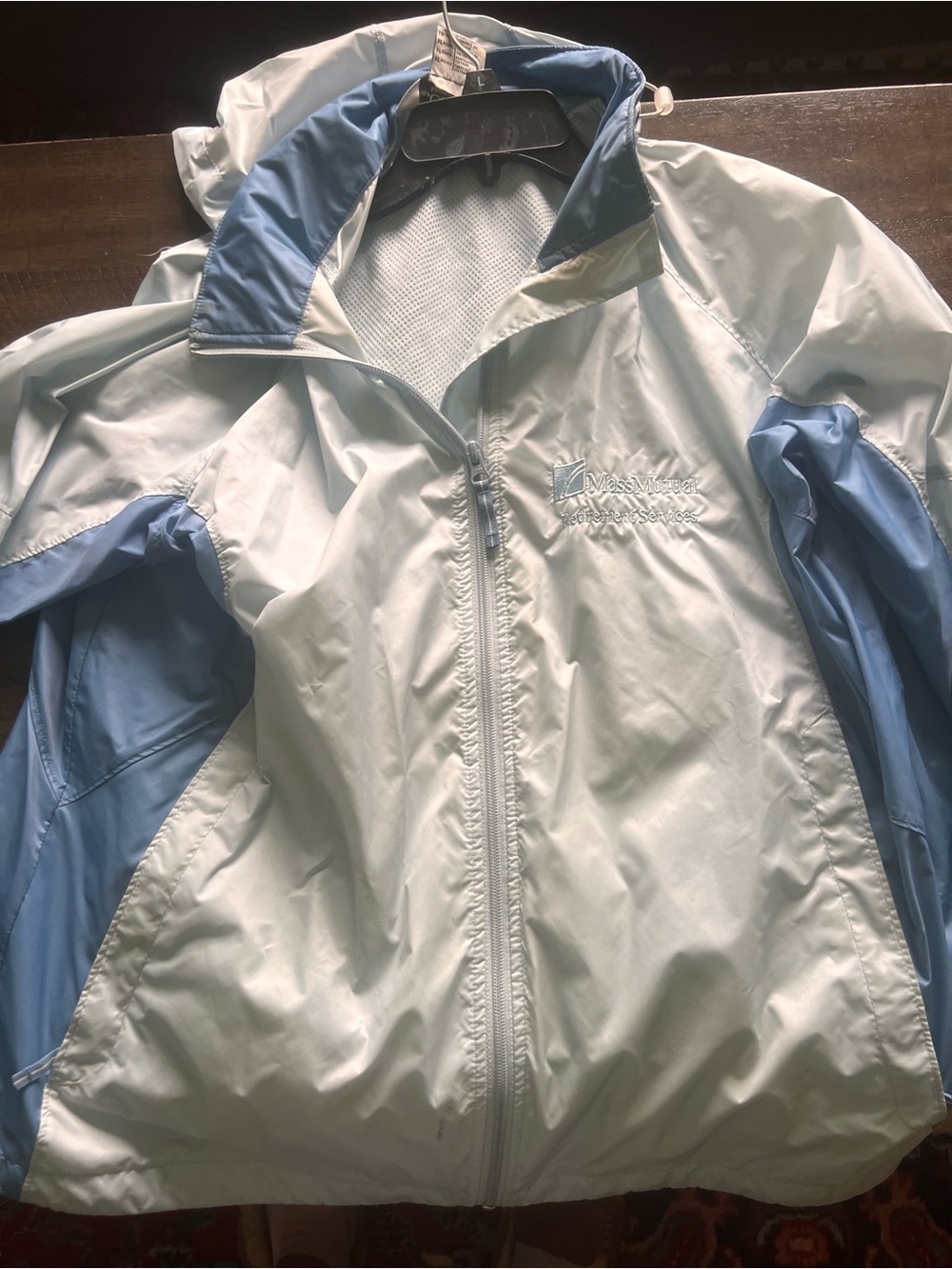 Light Blue Women's Windbreaker Jacket with Mass Mutual retirement services logo